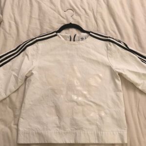 White trefoil top with zip closure